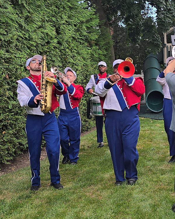 Saxophone and horns in the full band line-up