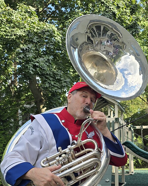 Sousaphone bell against the sky